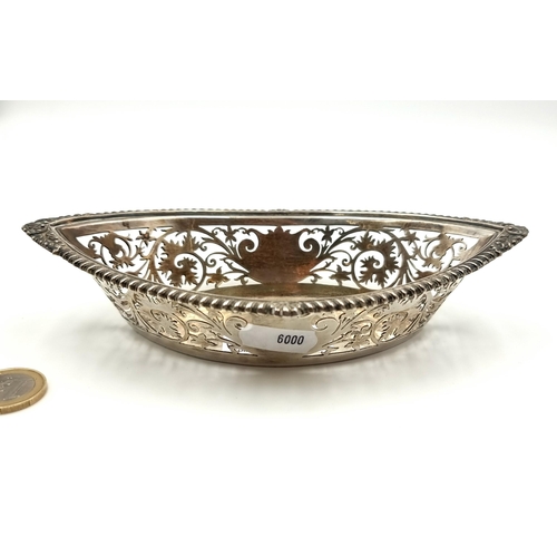 1 - Star lot: A beautifully detailed antique sterling silver elliptical dish, this example features attr... 