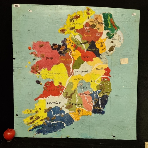 102 - A large vintage hand made wooden map of Ireland, with thick plaster details in high relief. Very cha... 