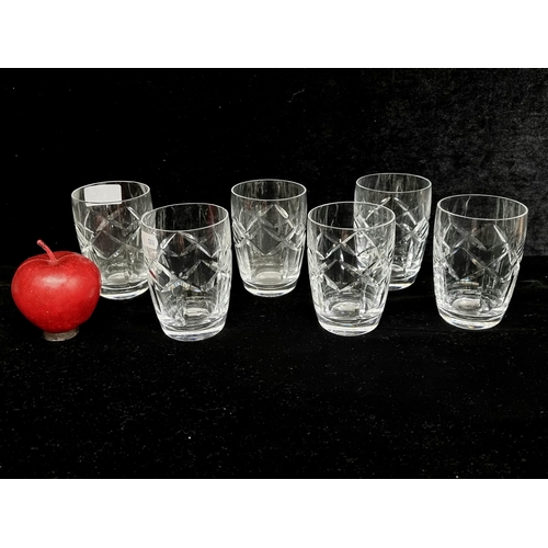 110 - A collection of six elegant Waterford Crystal tumblers in the Kerry pattern. Retaining acid mark to ... 