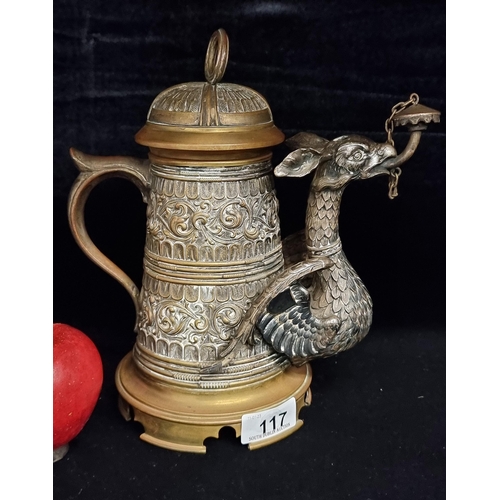 117 - Star lot : A highly decorative brass tankard in the form of a traditional 19th century Royal Prussia... 