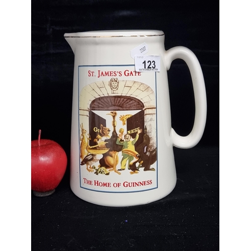 A large ceramic advertising pitcher for Guinness, illustrated with the iconic Hapless Zookeeper and an array of animals. Reading "St. James's Gate - The Home of Guinness".