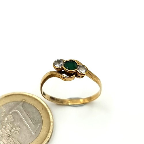 13 - A fabulous vintage 9 carat Gold Emerald and Gem set ring, featuring an unusual twist set mount. Ring... 