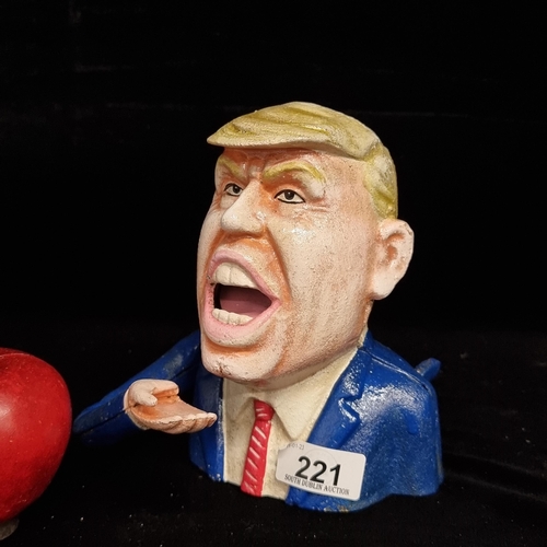 221 - A heavy cast metal coin box in a caricature of Donald Trump. Featuring one of his more colourful quo... 