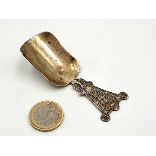 36 - A very fine example of an Irish silver caddy spoon, set with a beautifully detailed traditional Celt... 