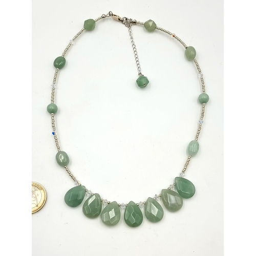 46 - A very attractive green Quartz tear drop facet cut stone necklace, with very pretty crystal set acce... 