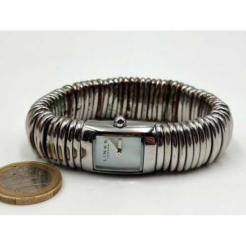 48 - A good looking weighty Links of London Ladies watch with MOP face and thick adjustable band.