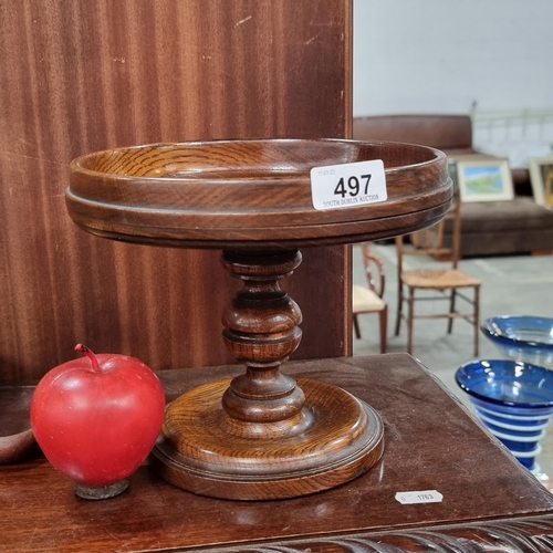 497 - A very early Georgian hand turned carved wooden pedestal stand. With turned stem and felt base for g... 