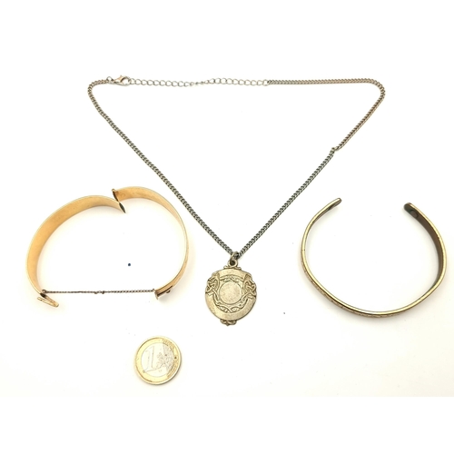 501 - A collection of items, consisting of a silver medallion and chain. The medallion is set with Celtic ... 