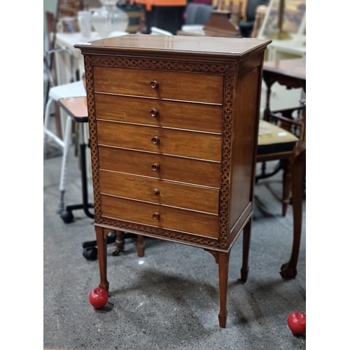 770 - Star lot : A handsome vintage wooden music cabinet with six drawers featuring fold-out fronts for ea... 