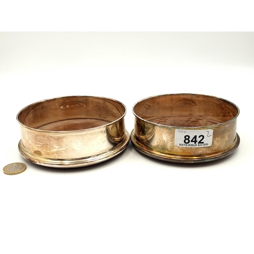 842 - A pair of 19th century EPNS magnum champagne / wine coasters. Featuring turned rosewood bases. Lined... 