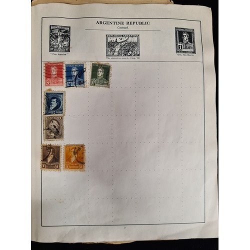 115 - A very impressive album of world stamps. Included are two George V examples, one overprinted with 