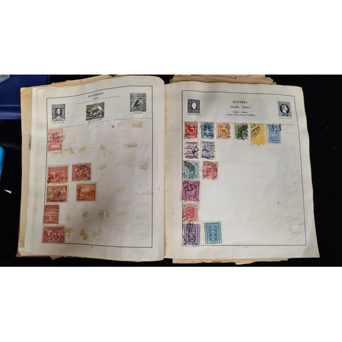 115 - A very impressive album of world stamps. Included are two George V examples, one overprinted with 