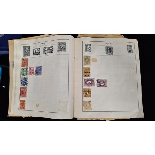 115 - A very impressive album of world stamps. Included are two George V examples, one overprinted with 