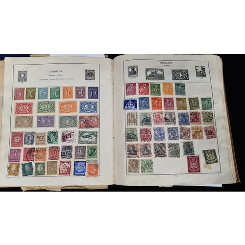 115 - A very impressive album of world stamps. Included are two George V examples, one overprinted with 