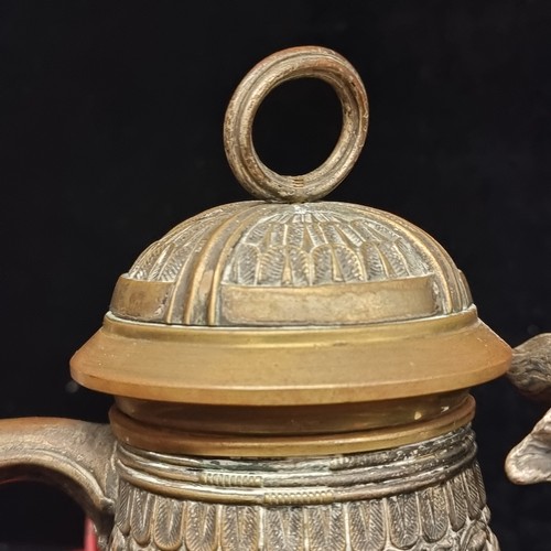 117 - Star lot : A highly decorative brass tankard in the form of a traditional 19th century Royal Prussia... 