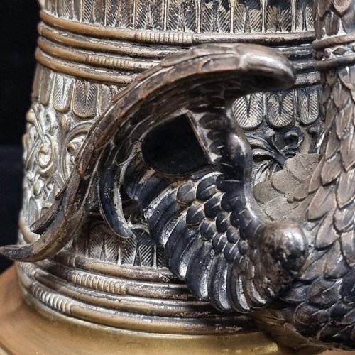 117 - Star lot : A highly decorative brass tankard in the form of a traditional 19th century Royal Prussia... 