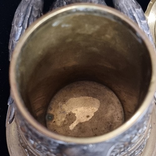 117 - Star lot : A highly decorative brass tankard in the form of a traditional 19th century Royal Prussia... 