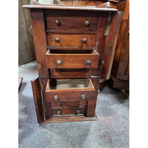 482 - Star lot A Victorian table top Wellington chest with eight neatly proportioned drawers with wooden k... 