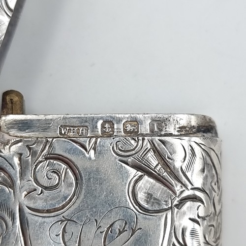 45 - A sterling silver antique vesta case of foliate design and initialled cartouche. Hallmarked Birmingh... 
