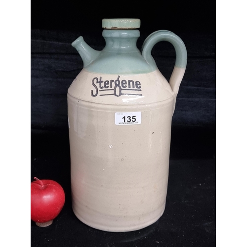 135 - A large, antique stoneware jug for Stergene deposit 2/6. Featuring a mint green glaze detail and ori... 