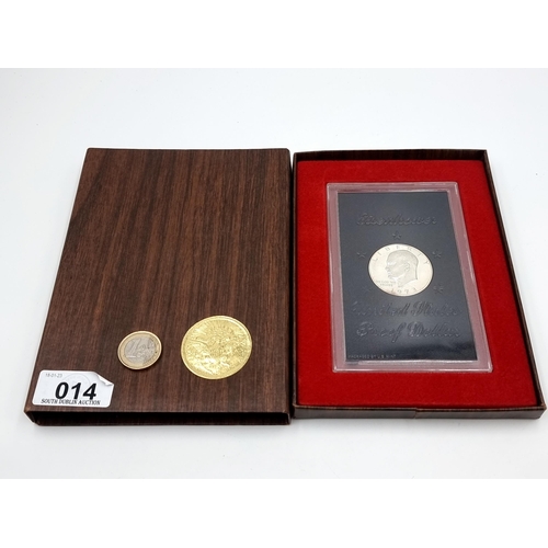 14 - A framed and mounted United States Silver proof dollar coin, of president Eisenhower. Dated 1973. Pa... 