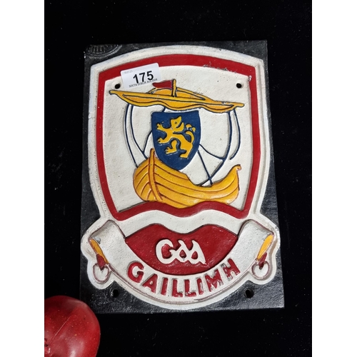 175 - A cast metal wall plaque for Galway GAA. In Irish and featuring a viking shop and lion passant.