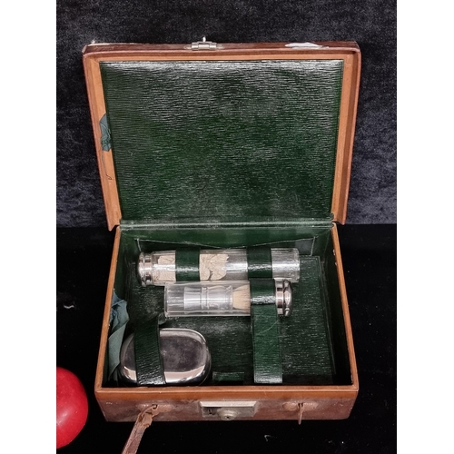 210 - A fabulous vintage travel men's vanity in a leather bound case with metal clasps. Accompanied by two... 