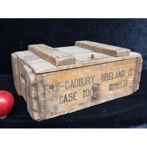 226 - An antique Fry's Cadbury Ireland Limited lidded wooden case with metal hinges and other fittings.