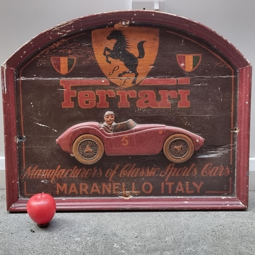 265 - A charming vintage advertising sign for Ferrari. With a wonderfully arched frame, hand painted lette... 