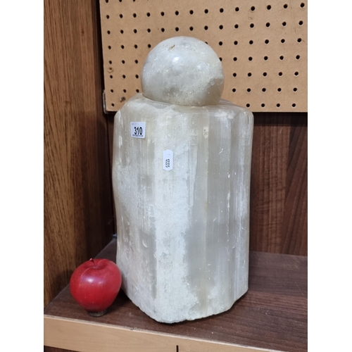 310 - A large quartz ball with solid quartz display podium. A heavy, attractive piece. Very heavy. would l... 