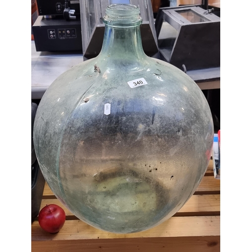 340 - A very large oversized globular glass vase, perfect for use outdoors or for a large terrarium. 
MM: ... 