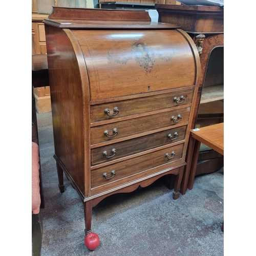 391 - Star lot : An elegant Edwardian ladies writing roll top desk with a pull out writing surface with fl... 