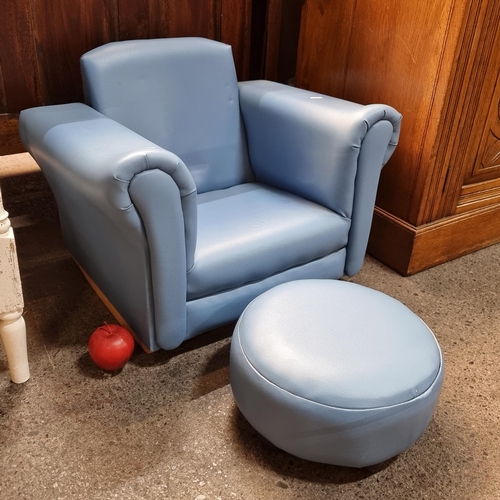 410 - An adorable rocking children's armchair with foot stool. Upholstered in a sky blue leather.