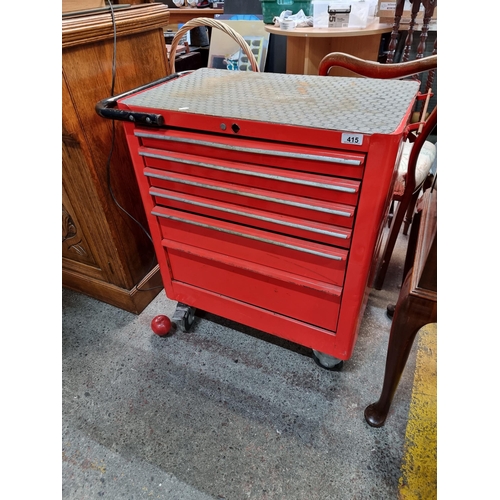 415 - Star Lot : A portable Facom trolley for mechanic tools with 6 drawers, set on castors, handles and w... 