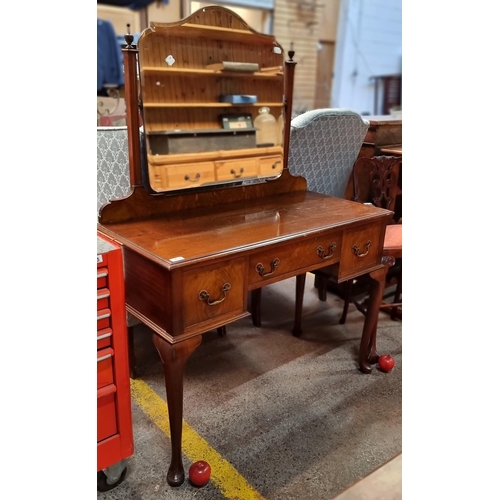 418 - A truly elegant antique flame mahogany sit in dressing table - with a central bevelled mirror, finel... 