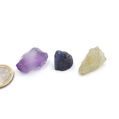 58 - A collection of three natural certified stones, consisting of a Natural Tanzanite of 32.50 carats. T... 