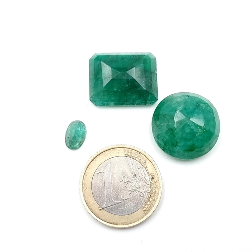 59 - A collection of three Natural Emerald certified stones, comprising of a 25.3 carats stone, a 19.55 c... 