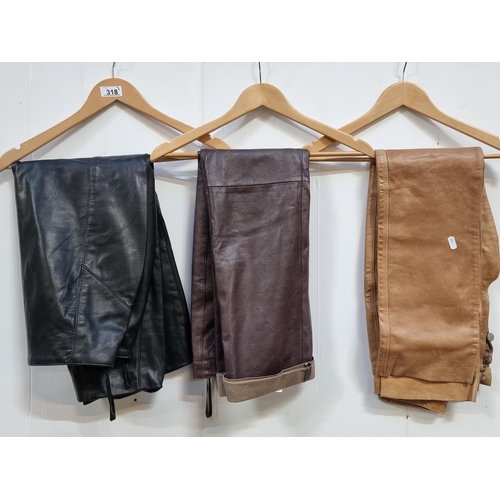 318 - Three genuine leather ladies items including a black pencil skirt (uk size 12), brown leather trouse... 