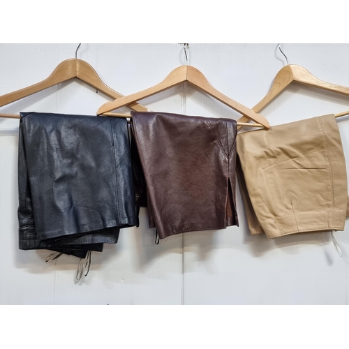 319 - Three genuine leather ladies skirts in uk sizes 8-10.