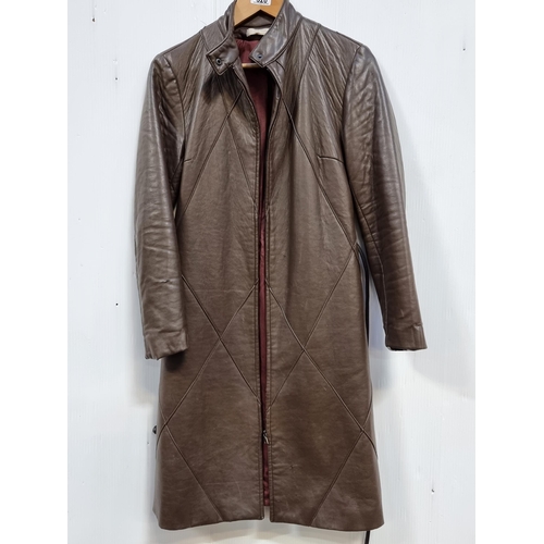 320 - A stunning stylish padded leather women's coat in brown, made by Belair. Fits uk size 6-8.