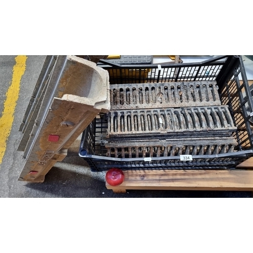 334 - A large crate of cast iron French drain grates along with six inground drains. 
MM: L50 x W13 cm eac... 