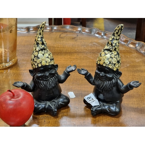 875 - Two Kare Design gnome ornaments with gilt floral hats. from a UK design company.