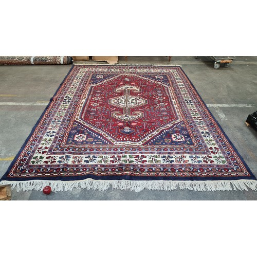 451 - Star lot A really beautiful handwoven Indian wool rug. A super impressive room rug with red and blue... 