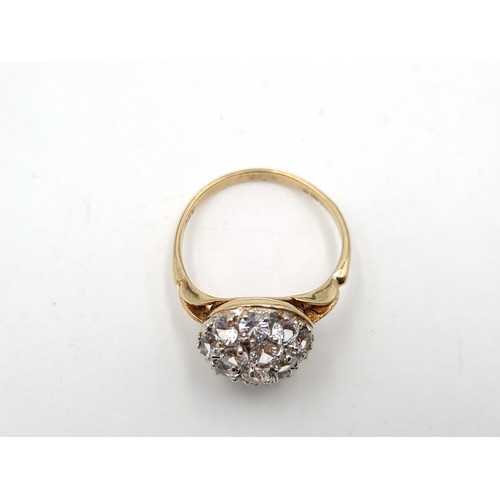 38 - A stunning 9 carat gold gem stone floral cluster ring. With a beautiful sparkle and fantastic crafts... 