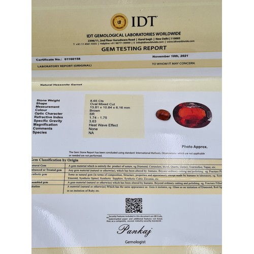 51 - A collection of two certified Garnet stones, including a 7.31 carat example. Together with a 8.65 ca... 