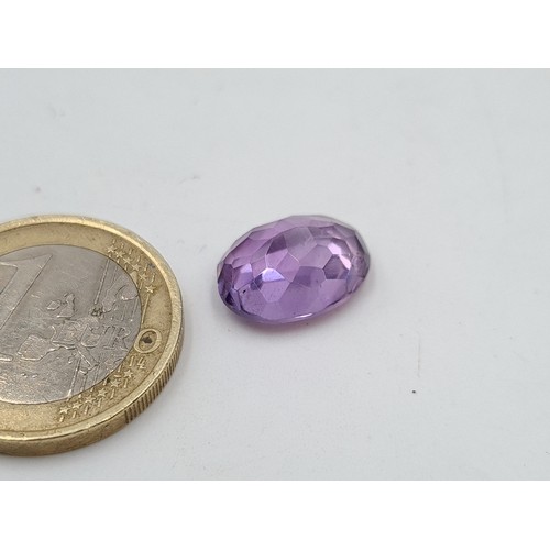 53 - An assorted collection of certified stones, comprising of a 17.31 carat Amethyst and a stunning squa... 