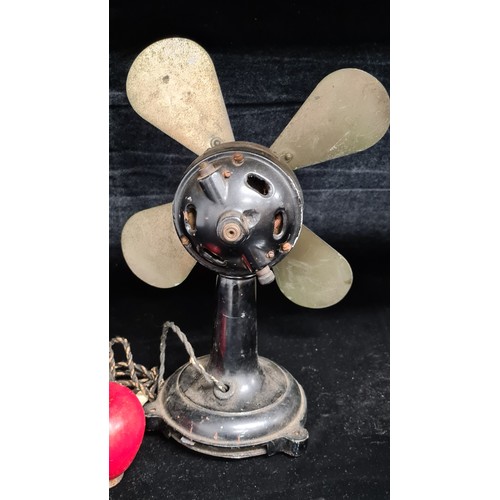 137 - An early, vintage tabletop desk fan. A very heavy cast iron example by Italian brand Marelli, Milano... 