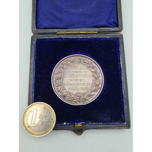 553 - An antique Sterling  silver Cheshire Agricultural Society medallion, awarded to a H. Hodgkin Sons of... 