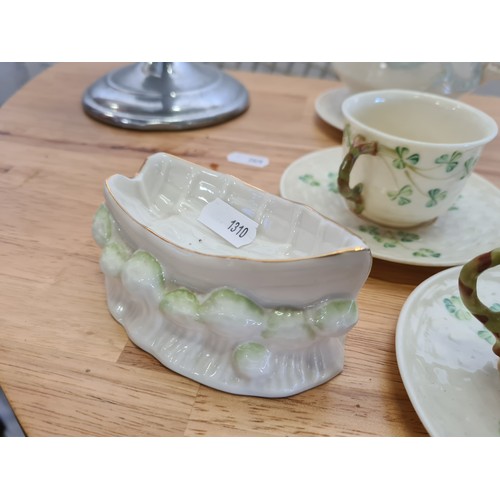 625 - Seventeen pieces of Belleek porcelain including tea cups, saucers, teapot, water jug and a dish in t... 