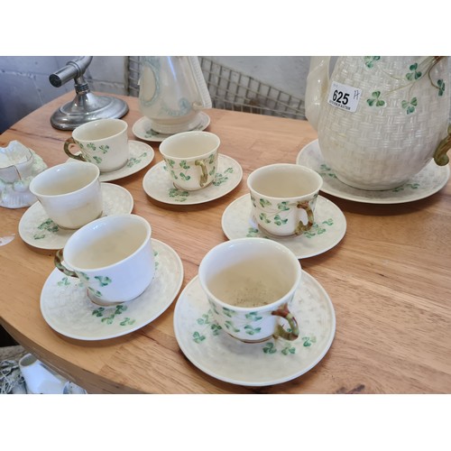 625 - Seventeen pieces of Belleek porcelain including tea cups, saucers, teapot, water jug and a dish in t... 